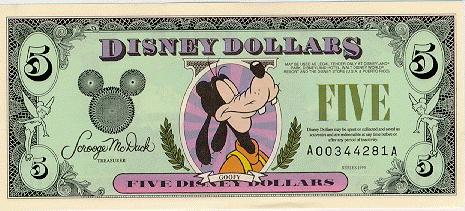 front of 5 Disney Dollar bill